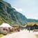 A recreation of a medieval village situated next to a fjord